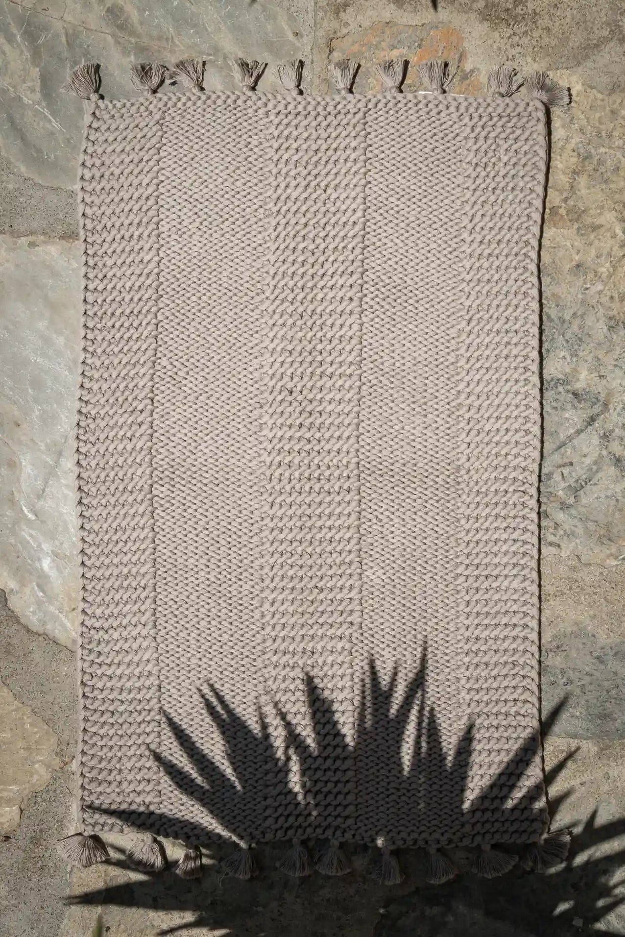 Hand Knitted Bath Rug with tassels – Warm Gray